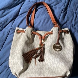 Tan and brown Michael kors bag